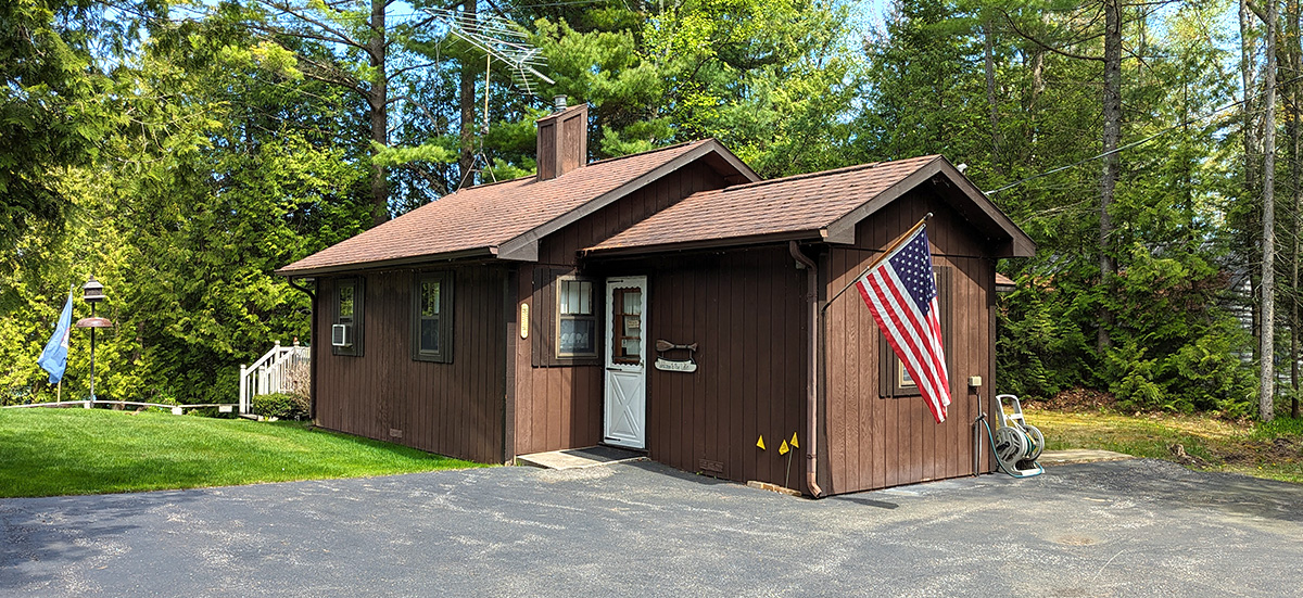 outside of Cedar Cliff Cottage from driveway, facing the kitchen door